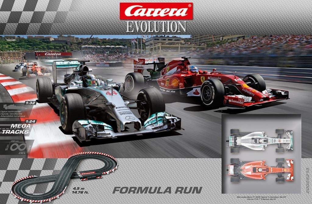 Carrera Evolution Verpackung mit zwei Fahrzeugen im Maßstab 1:32.